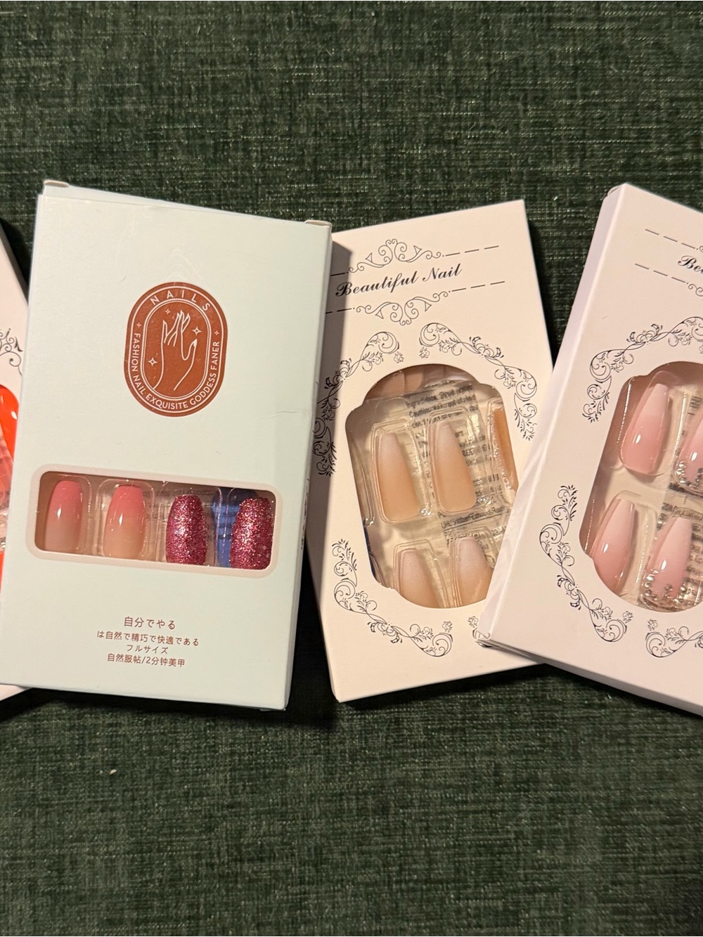 4 variations of long press on nails, new in box.